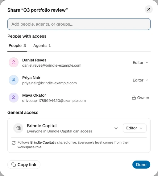 The share sheet of a folder: three people and an agent with their roles, and the workspace default